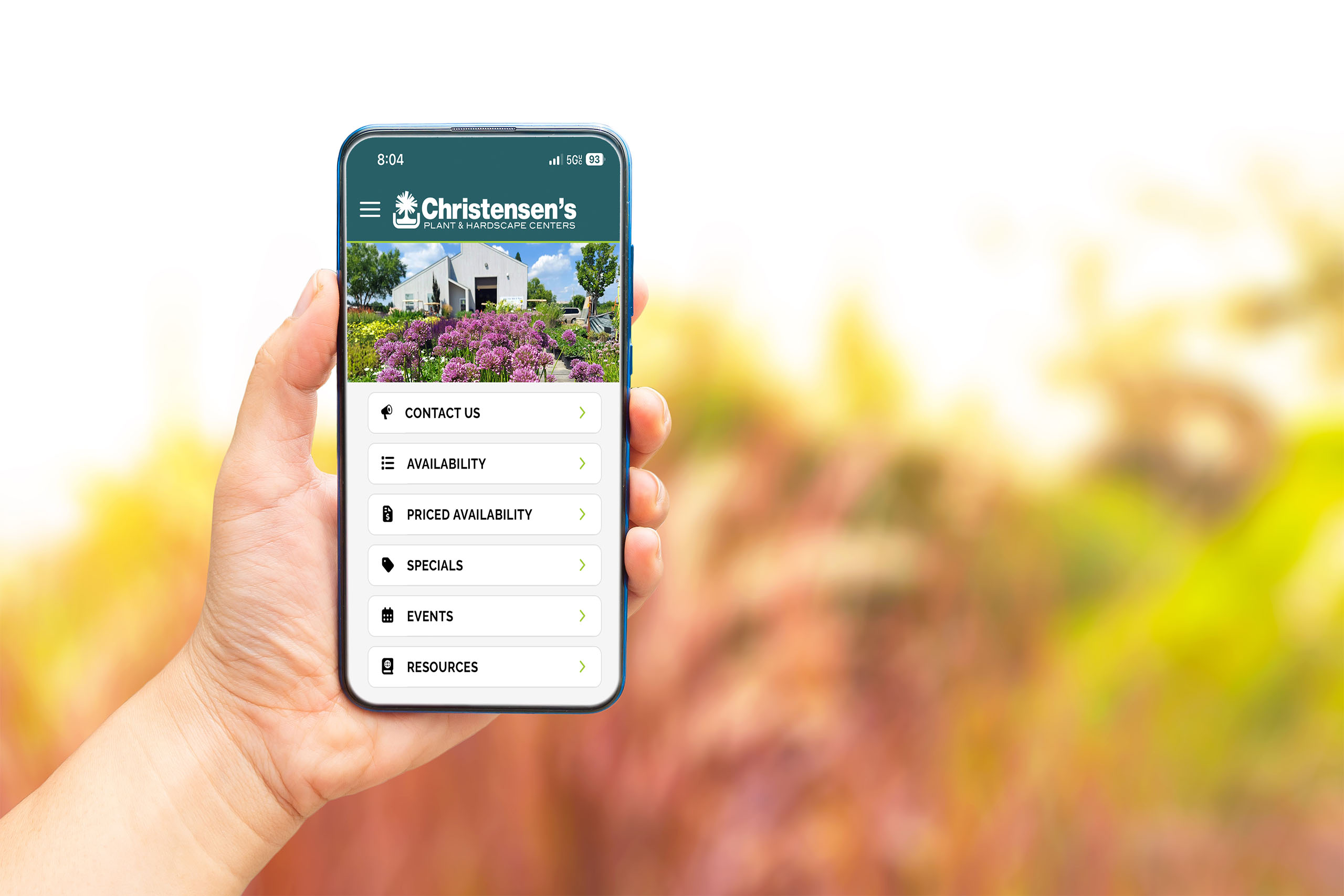 hand holding phone showing mobile app interface